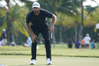FILE - Dustin Johnson reacts after putting on the 17th green during the final round of the LIV Golf Team Championship at Trump National Doral Golf Club, Oct. 30, 2022, in Doral, Fla. Players who defected from the PGA Tour to join Saudi-funded LIV Golf are still welcome at the Masters next year, even as Augusta National officials expressed disappointment Tuesday, Dec. 20, in the division it has caused in golf. (AP Photo/Lynne Sladky, File)