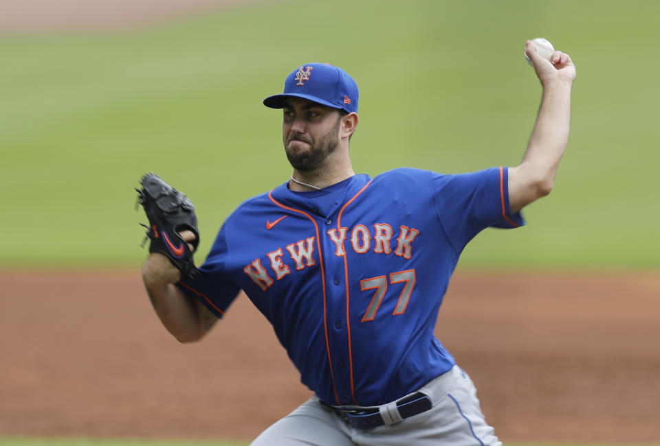 New York Mets starting pitcher David Peterson (77) delivers in the first inning of a baseball game against the Atlanta Braves, Sunday, Aug. 2, 2020, in Atlanta. (AP Photo/Brynn Anderson)
