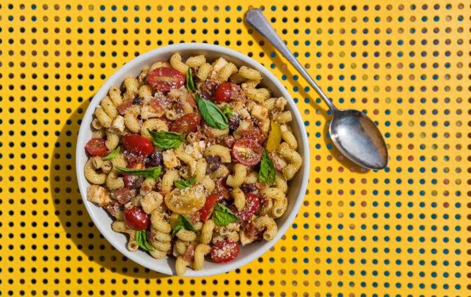 <p>Jon Ashton</p><p>Summer fresh cherry tomatoes, olives and lots of pepperoni give this pasta salad a big flavor.</p><p><strong>Get the recipe: </strong><strong><a href="https://parade.com/1046957/jonashton/pepperoni-pasta-salad-with-mozzarella-and-pesto/" rel="nofollow noopener" target="_blank" data-ylk="slk:Pepperoni Pasta Salad With Mozzarella and Pesto;elm:context_link;itc:0;sec:content-canvas" class="link ">Pepperoni Pasta Salad With Mozzarella and Pesto</a></strong></p>