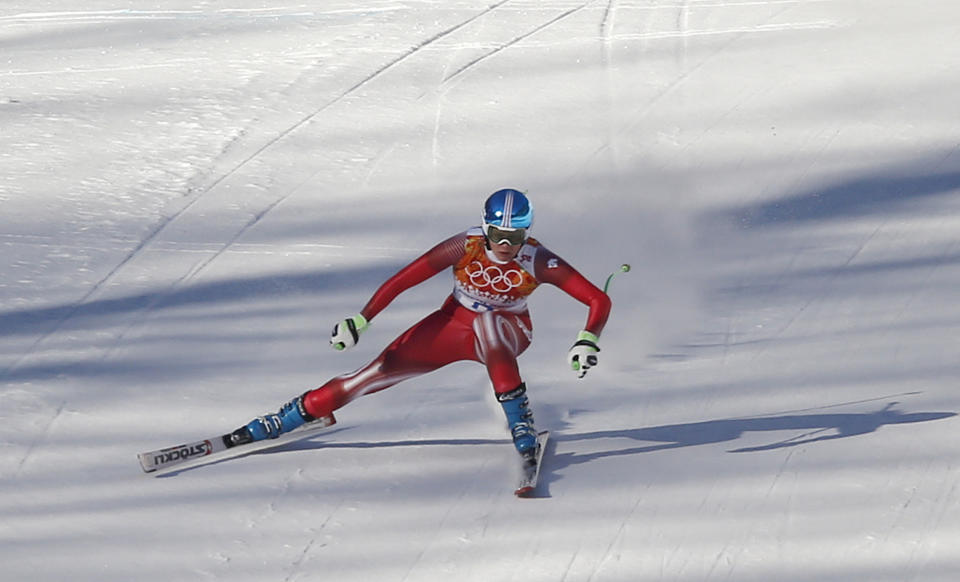 Switzerland's Nadja Jnglin-Kamer loses her footing just before crashing near the finish line during a women's downhill training run for the Sochi 2014 Winter Olympics, Saturday, Feb. 8, 2014, in Krasnaya Polyana, Russia.(AP Photo/Christophe Ena)