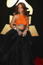 <p>RiRi’s bra top revealed her chest and back ink. (Photo: Getty Images) </p>