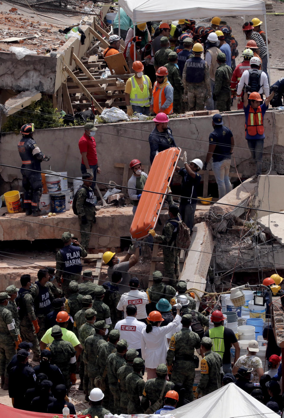 Rescue workers race to find survivors at collapsed Mexico City school