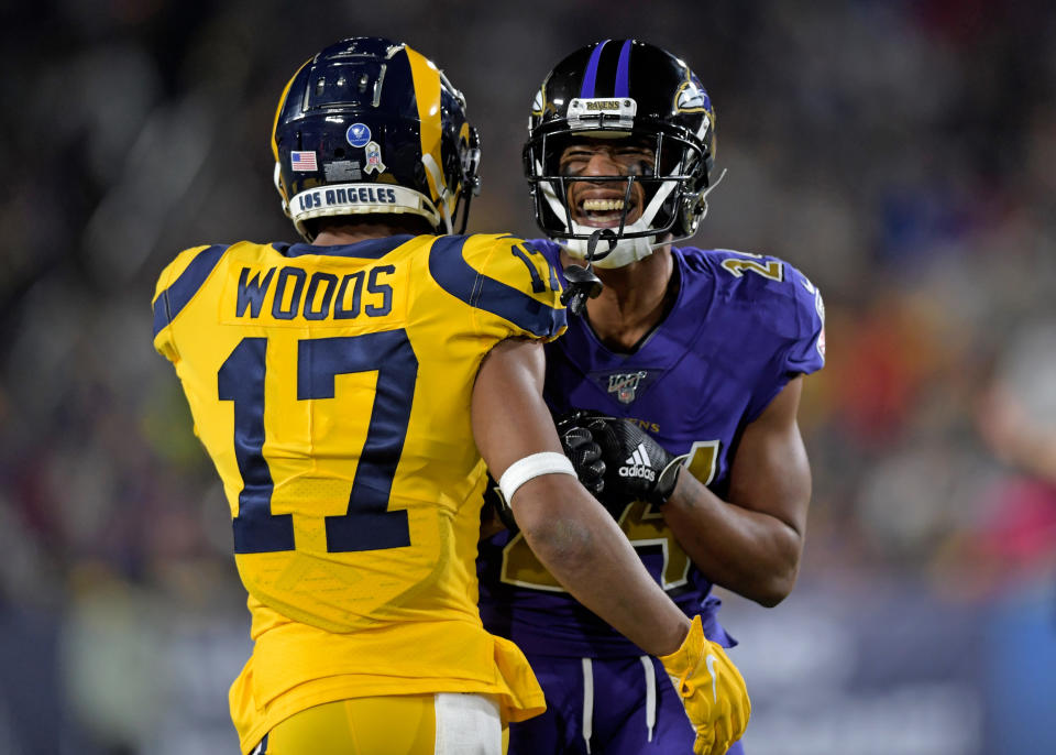 Nov 25, 2019; Los Angeles, CA, USA; Los Angeles Rams wide receiver Robert Woods (17) and Baltimore Ravens cornerback Marcus Peters (24) talk during the first half at Los Angeles Memorial Coliseum. Mandatory Credit: Kirby Lee-USA TODAY Sports