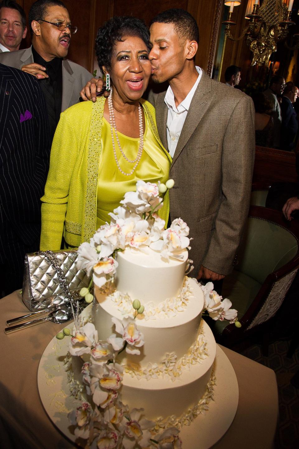 Aretha Franklin and her son Kecalf Cunningham attend her 72nd birthday celebration in March 2014 in New York. 