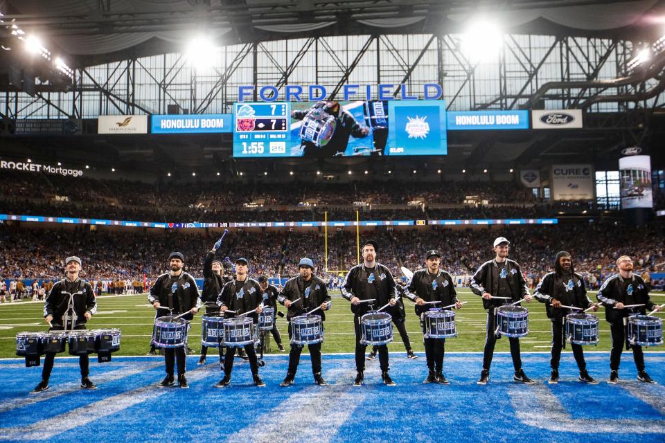 Detroit Lions drumline members perform in the end zone at Ford Field in Detroit during the second quarter against Chicago Bears on Sunday.