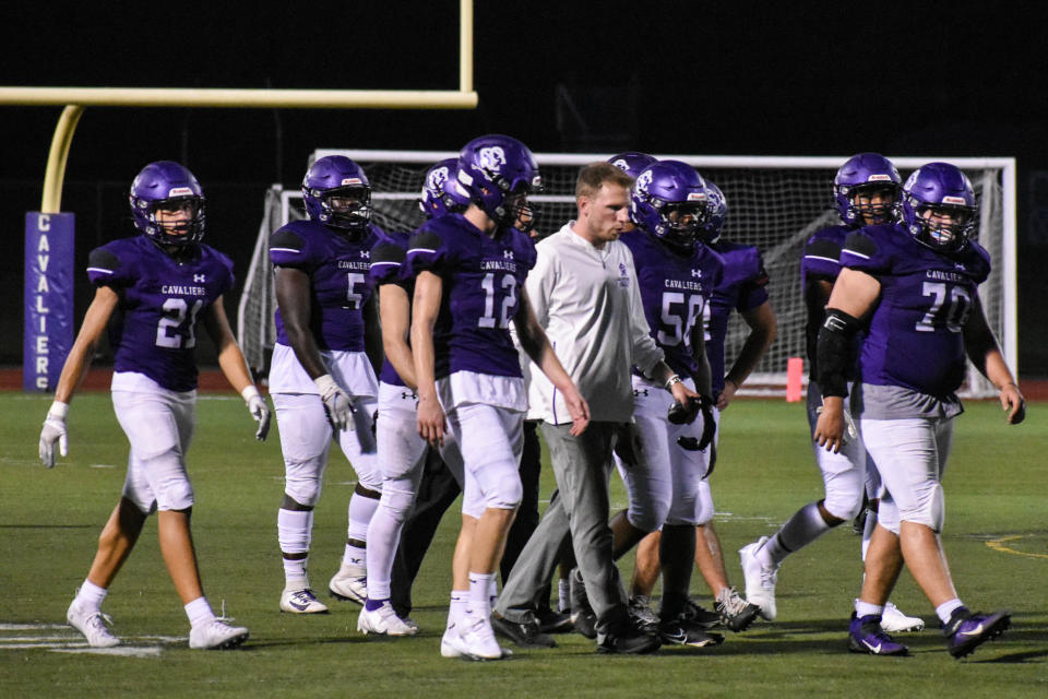 East Stroudsburg South head football coach Matt Walters talks and walks with players during a time out in East Stroudsburg on Saturday, Sept. 18, 2021. South beat Pleasant Valley, 36-14.