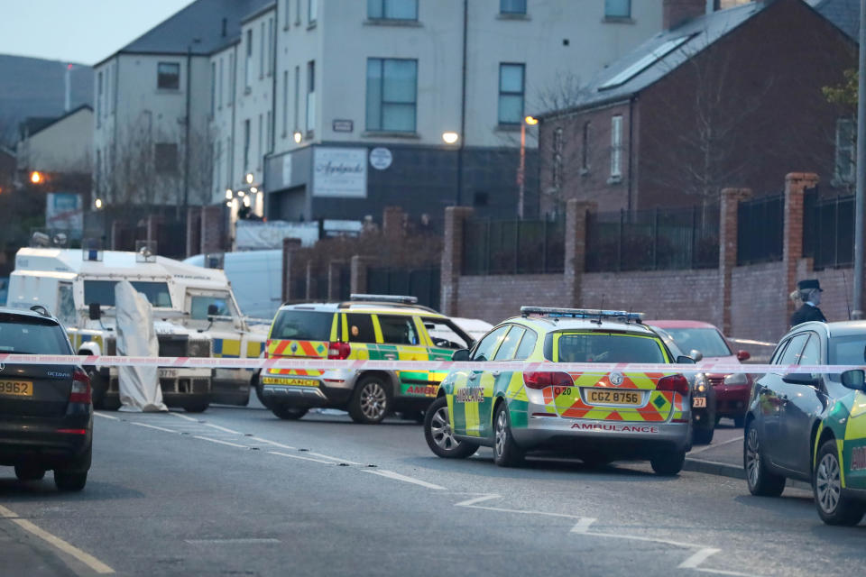 <p>Scores of children looked on as a lone gunman shot dead a man sitting in his car outside a school in west Belfast.</p>