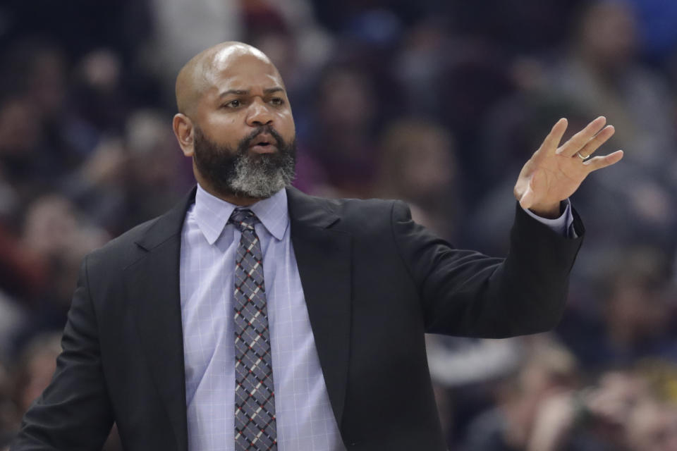 FILE - In this March 2, 2020 file photo, Cleveland Cavaliers head coach J.B. Bickerstaff gives instructions to players in the first half of an NBA basketball game against the Utah Jazz in Cleveland. On Friday, March 6 Bickerstaff, Andre Drummond, Cavs guards Collin Sexton and Darius Garland, forwards Cedi Osman, Dante Exum and Dylan Windler, spent several hours visiting with offenders at Grafton _ a medium security prison housing 1,700 residents _ to share fellowship as well as some hope and hoops.(AP Photo/Tony Dejak, File)