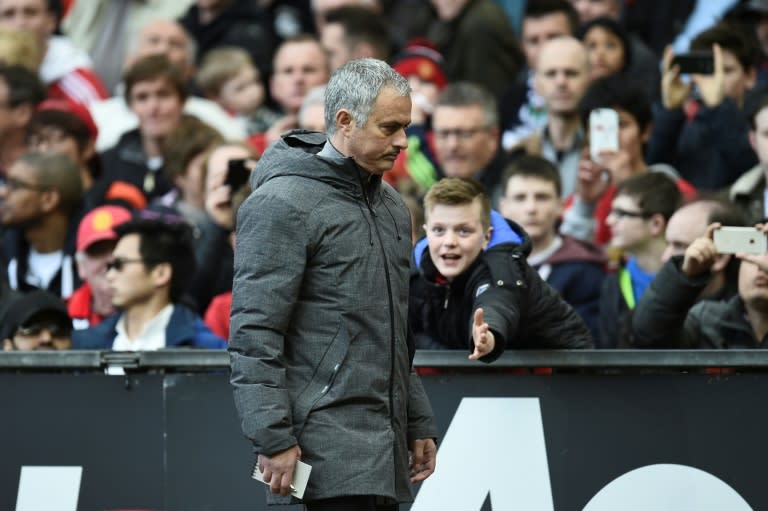 Manchester United's Jose Mourinho leaves the pitch at half-time during their match against West Bromwich Albion at Old Trafford in Manchester, north west England, on April 1, 2017