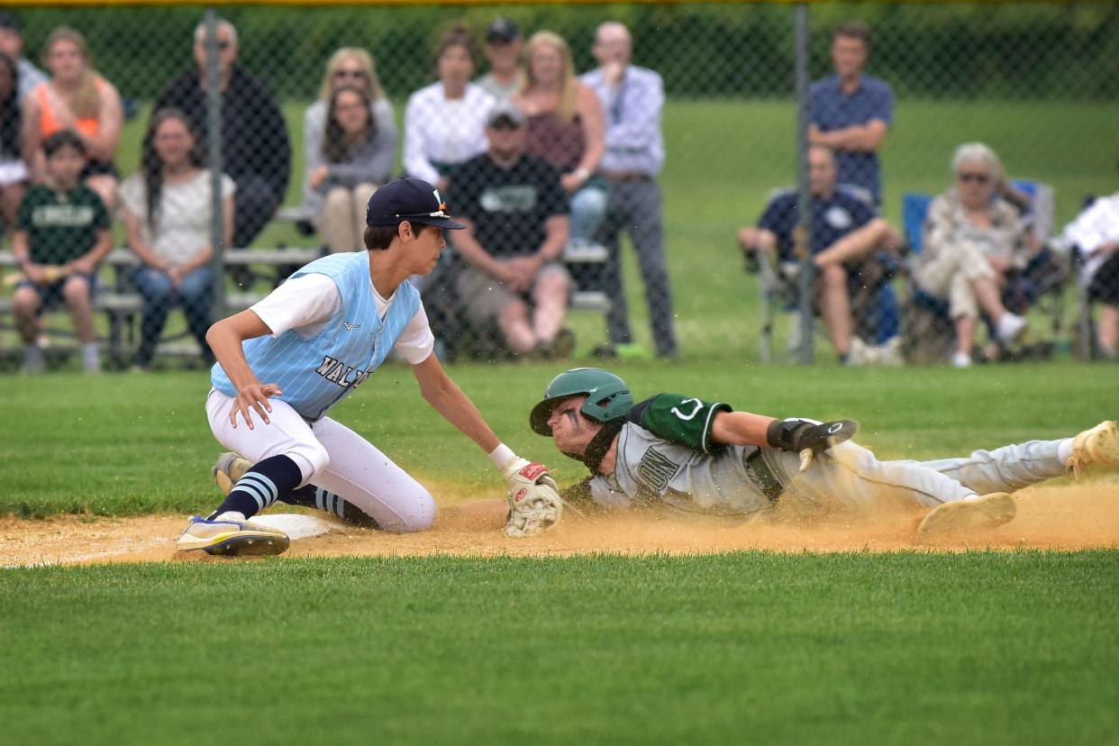 Zach Turko, #1 of Kinnelon is tagged out by Justin Dressler, #44 of Waldwick at third as he tried to steal the base in the first inning during their semifinal round of the NJSIAA North 1, Group 1 baseball tournament in Waldwick, Tuesday on 06/07/22.