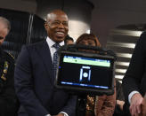 In this photo provided by The Metropolitan Transportation Authority (MTA), Mayor Eric Adams smiles during a news conference about new portable weapon detectors in New York, March 28, 2024. New York City officials announced a pilot program on Thursday to deploy portable gun scanners in the subway system, part of an effort to deter violence underground and to make the system feel safer. (Marc A. Hermann/Metropolitan Transportation Authority via AP)