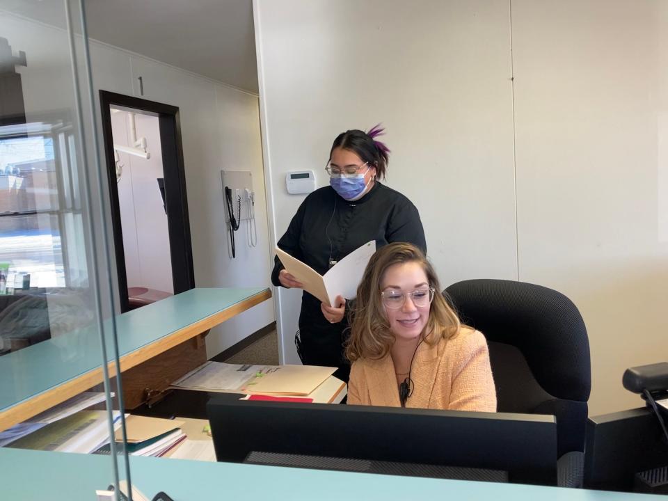 Meadowbrook Smiles Family Dentistry staff create new patient records for N.E.W. Community Shelter residents in Howard.