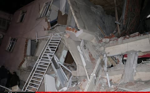 Buildings collapsed in Sursu neighborhood, Elazig, Turkey - Credit: Anadolu Agency