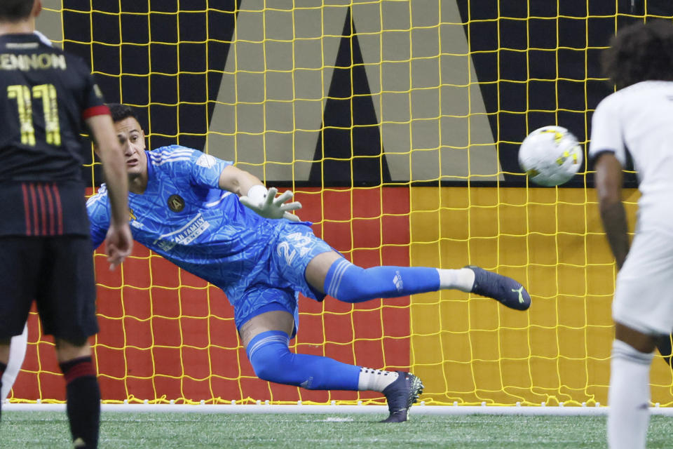 Atlanta United goalkeeper Raúl Gudiño (23) cannot defend against a penalty kick by Toronto's Federico Bernardeschi in the second half of an MLS soccer match on Saturday, Sept. 10, 2022, in Atlanta. (AP Photo/Bob Andres)