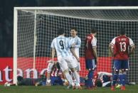 Argentina's Gonzalo Higuain celebrates his goal against Paraguay with teammate Lionel Messi during their Copa America 2015 semi-final soccer match at Estadio Municipal Alcaldesa Ester Roa Rebolledo in Concepcion, Chile, June 30,2015. REUTERS/Mariana Bazo