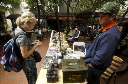 U.S. military items used during the Vietnam War are seen displayed for sale at an old items market in Hanoi March 14, 2015. REUTERS/Kham