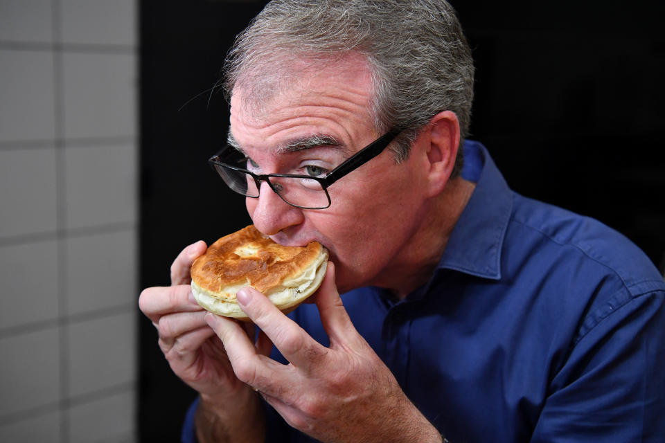 NSW Leader of the Opposition Michael Daley has a plain pie and strawberry milk for breakfast at House of Pie in Matraville. Source: AAP