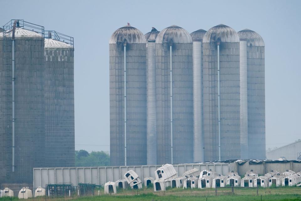 Hazy smoke still lingers around the Michigan State University Dairy Cattle and Teaching Research Center Sunday morning May 16, 2021 after a fire Saturday night.