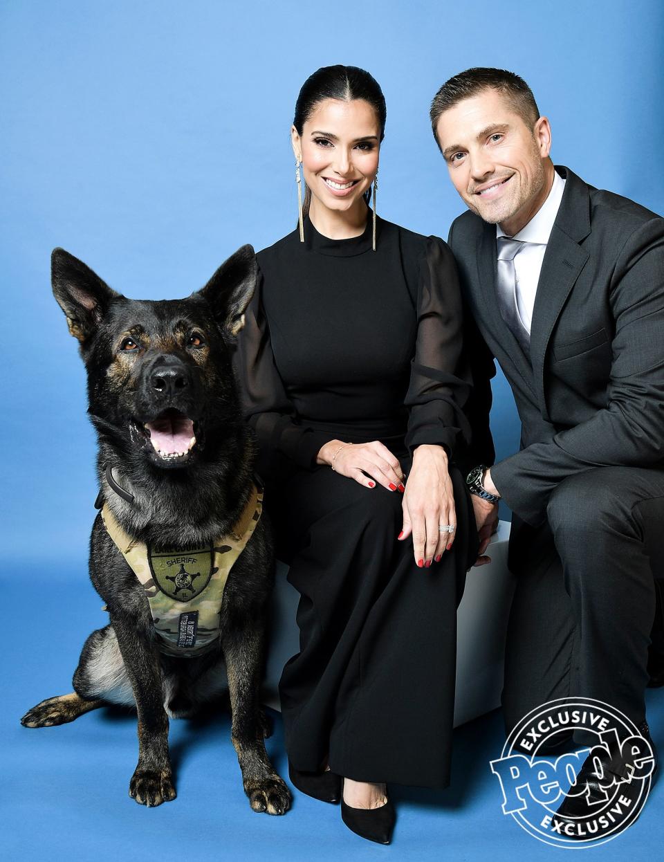 Roselyn Sánchez and Eric Winter with K-9 Dax
