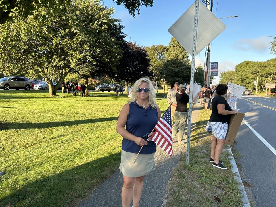 "We have no affordable housing here. We have no resources here to support this influx of population in our town. We are still very much a seasonal community that relies on tourism," said Yarmouth resident Cheryl Ball, speaking to the Times during a protest Tuesday that she helped organize outside Yarmouth Town Hall before a Board of Selectmen meeting.