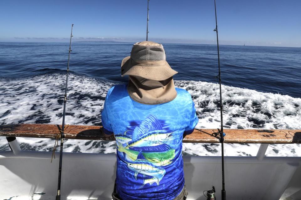 The Enterprise fishing boat ferries fishermen to warming waters near Catalina Island in search of rare schools of Dorado.