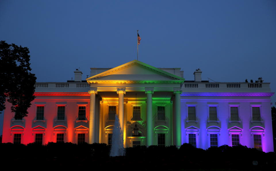 The White House is illuminated in rainbow colors after today's historic Supreme Court ruling legalizing gay marriage in Washington June 26, 2015.    REUTERS/Gary Cameron       TPX IMAGES OF THE DAY     
