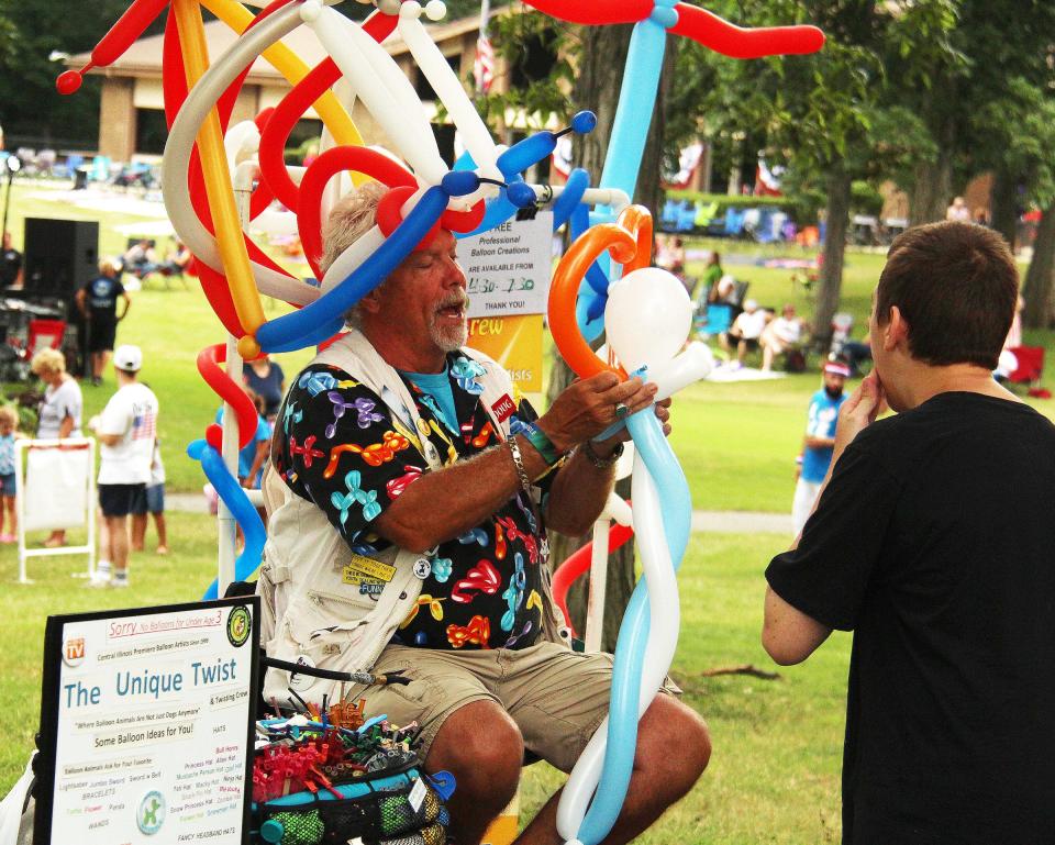 Making balloon animals and other items was a popular part of the weekend celebration taking place Saturday at The Oaks at River's Edge.