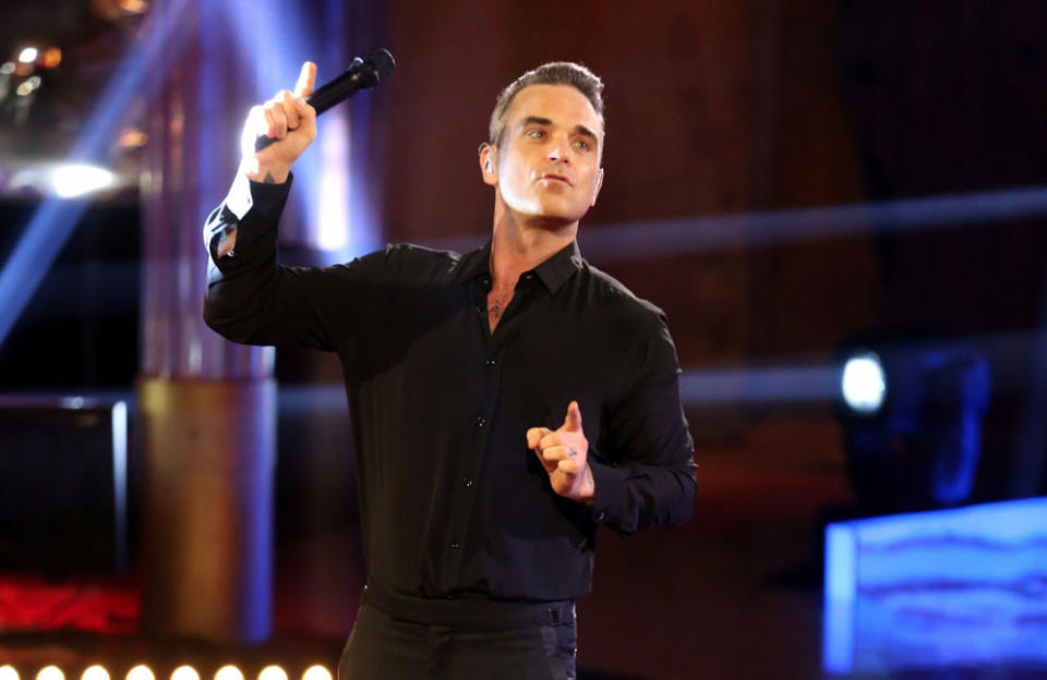 Robbie Williams will appear in his own biopic credit:Bang Showbiz