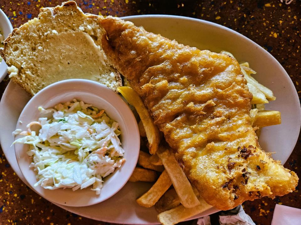 Fish & chips with coleslaw and soda bread at The Celtic Ray Public House in Punta Gorda photographed Sept. 15, 2023.