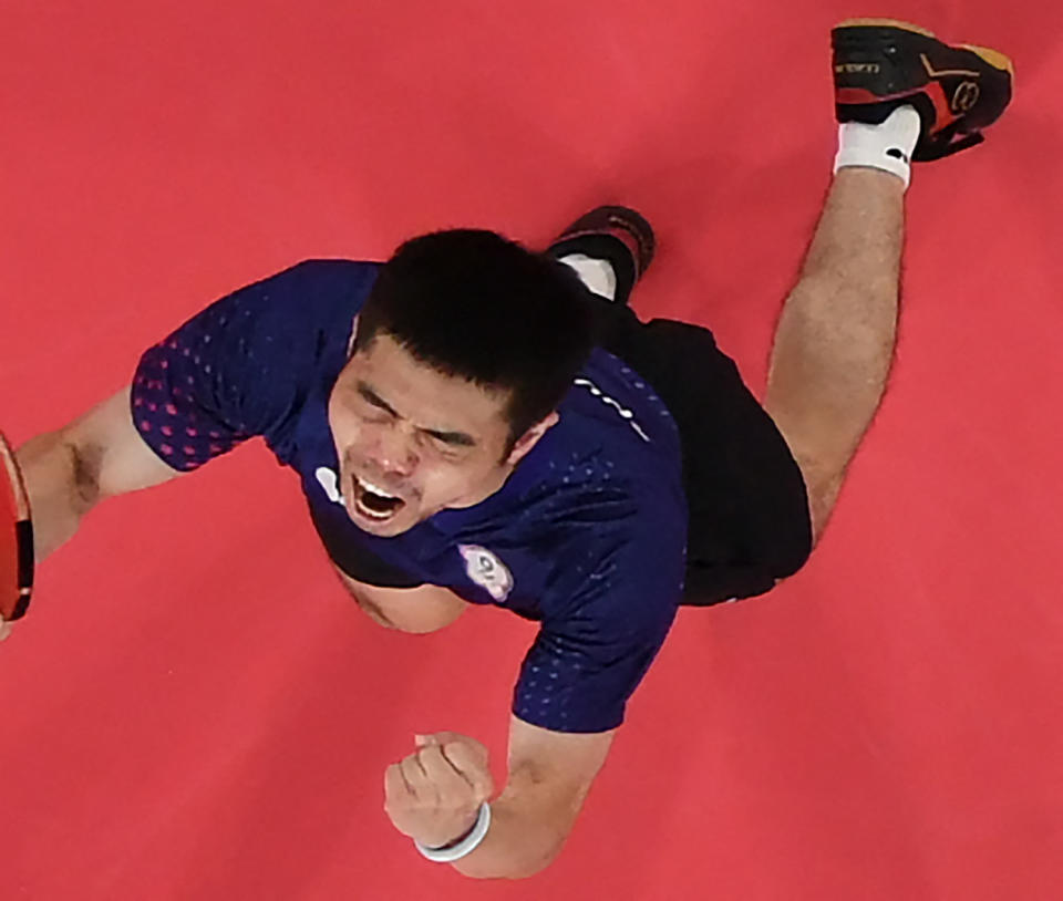 An overview image shows Taiwan's Chuang Chih-yuan celebrating his victory over Hong Kong's Wong Chun-ting in his men's singles round 3 table tennis match at the Tokyo Metropolitan Gymnasium during the Tokyo 2020 Olympic Games in Tokyo on July 26, 2021. (Photo by Jung Yeon-je / POOL / AFP) (Photo by JUNG YEON-JE/POOL/AFP via Getty Images)