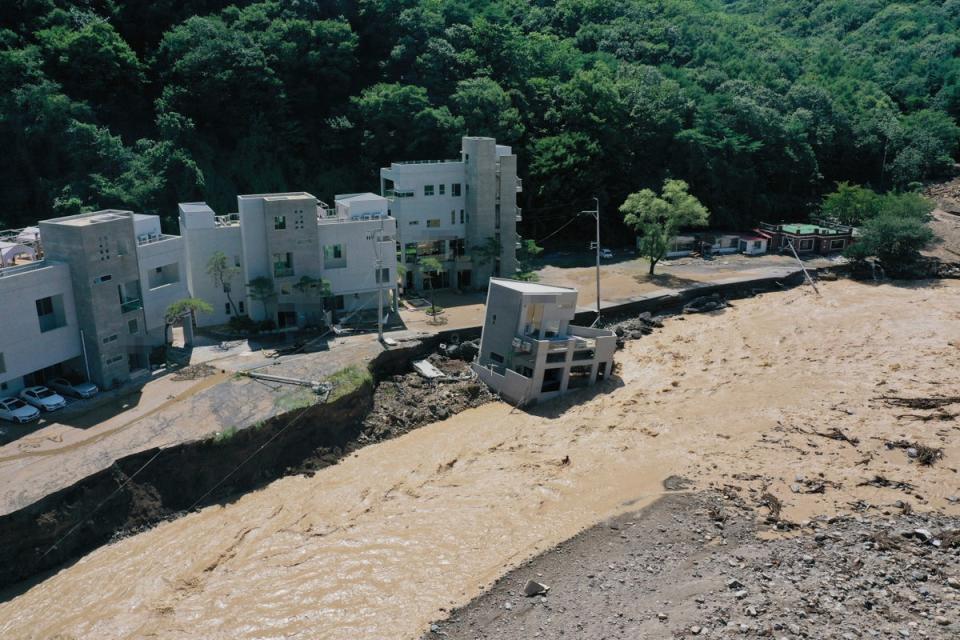 A building is swept away at a village in Pohang (AP)