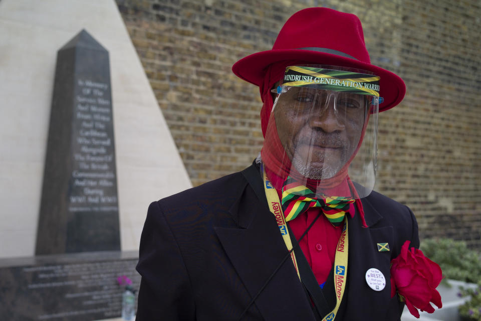 <p>LONDON, ENGLAND - JUNE 22: Elder Roger N M Mighton poses next to the memorial honoring the two million African and Caribbean military servicemen and women who served in World War I and World War II, during an event to mark Windrush Day in Windrush Square on June 22, 2021 in London, England. Windrush Day 2021 marks the 73rd anniversary of the arrival of MV Empire Windrush at the Port of Tilbury, near London, on 22 June 1948. The ship carried hundreds of people from the Caribbean who had been encouraged by the UK to come and work in the public services sector and is a seminal moment in Britain's history coming to represent the country's rich diversity. (Photo by Dan Kitwood/Getty Images)</p>
