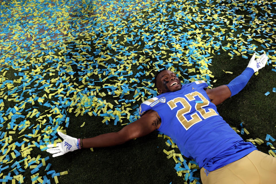 PASADENA, CALIFORNIA - SEPTEMBER 04:   Obi Eboh #22 of the UCLA Bruins celebrates after a win against the LSU Tigers at Rose Bowl on September 04, 2021 in Pasadena, California. (Photo by Ronald Martinez/Getty Images)