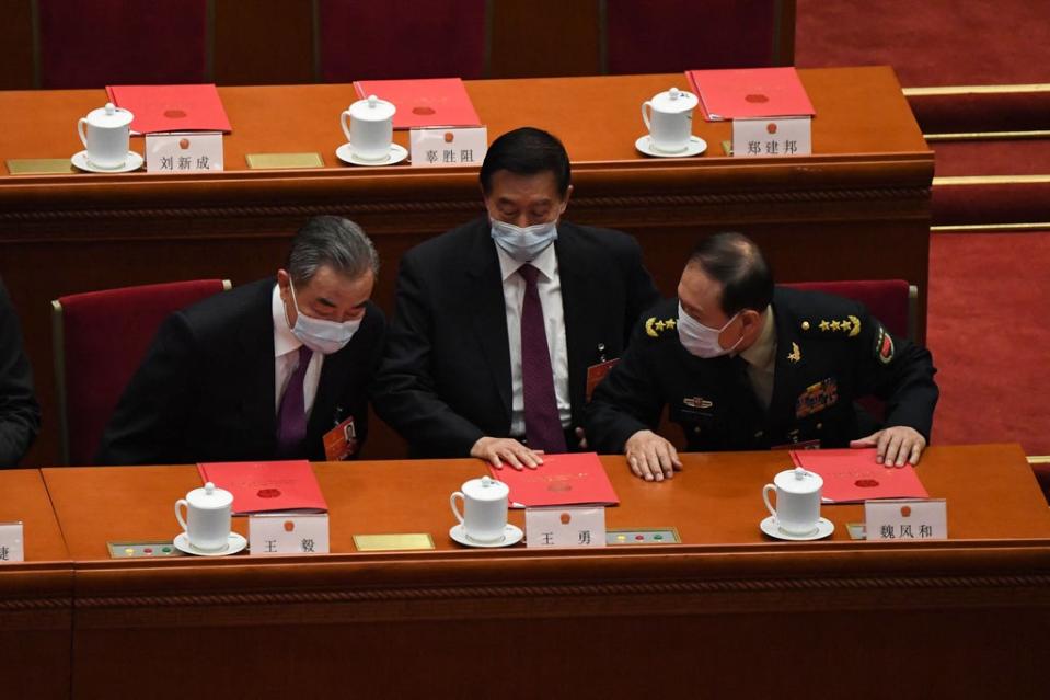 China's Foreign Minister Wang Yi (L)  (AFP via Getty Images)