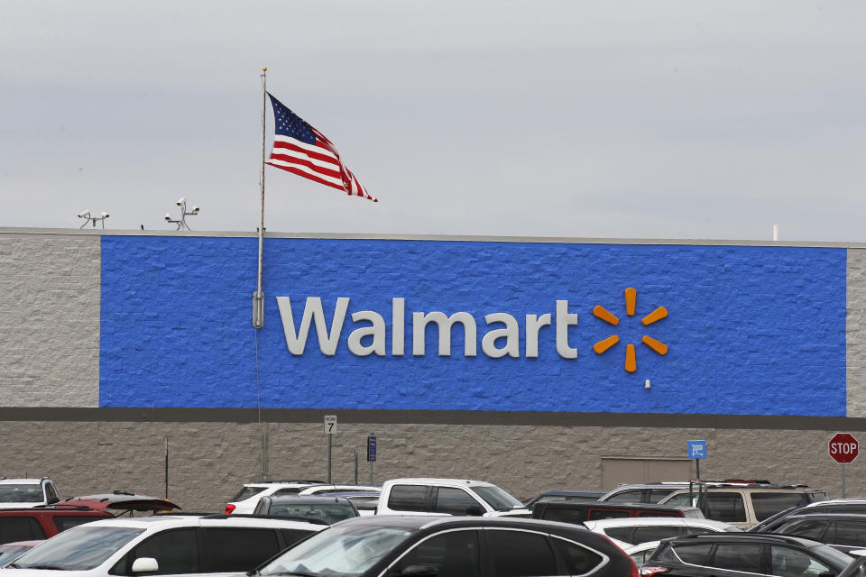 Signage is pictured at a Walmart store Tuesday, Aug. 4, 2020, in Oklahoma City. (AP Photo/Sue Ogrocki)