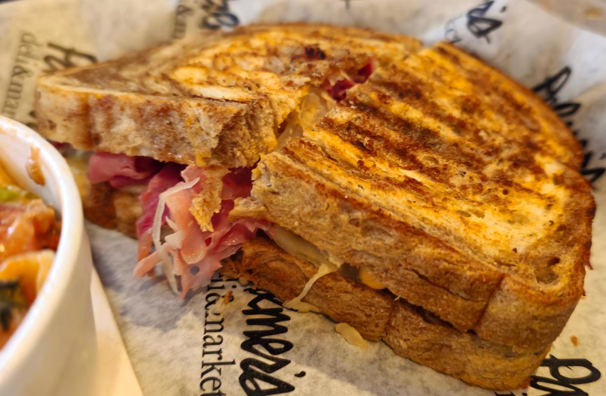 A classic Reuben comes with pastrami and Swiss cheese along with Thousand Island dressing and sauerkraut at Palmer's Deli.