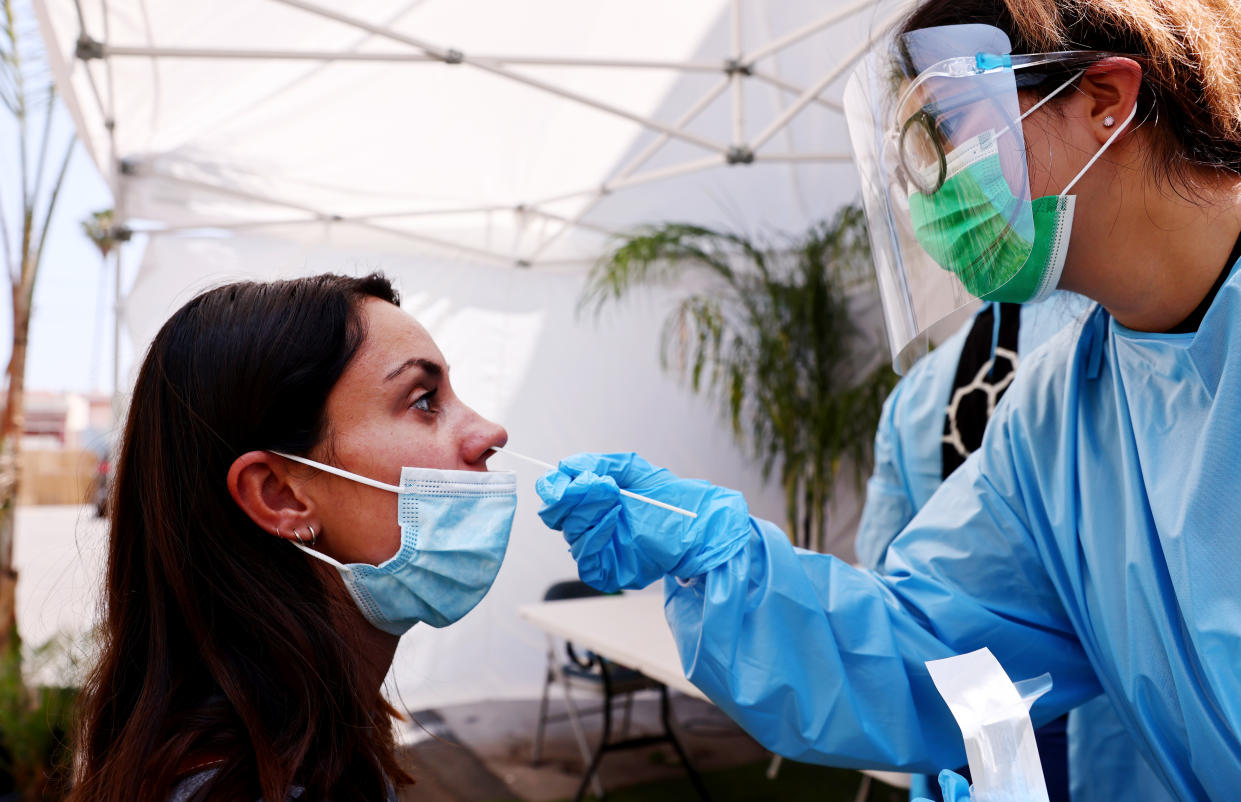 National Nurses United is urging the CDC to reinstate universal masking recommendations for people, regardless of their vaccination status. (Photo by Mario Tama/Getty Images)