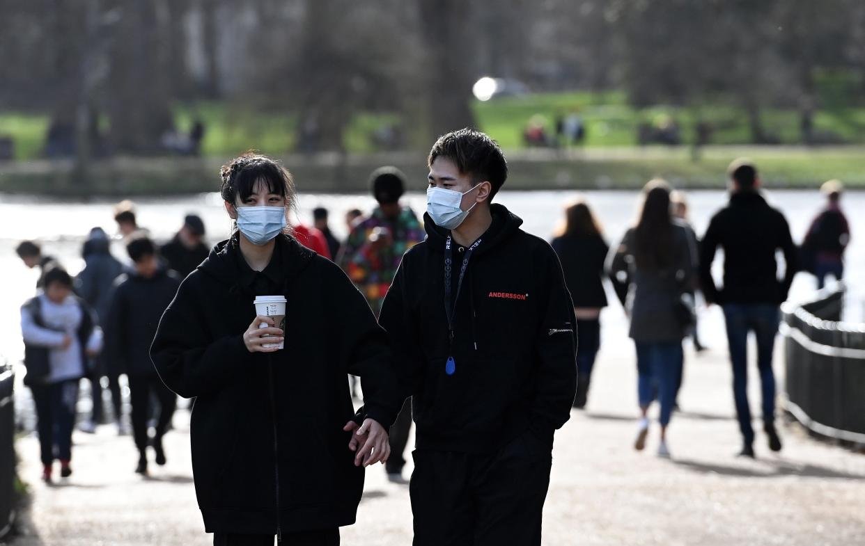 <p>People will be allowed to meet outdoors with one person from outside their household from 8 March</p> (EPA)