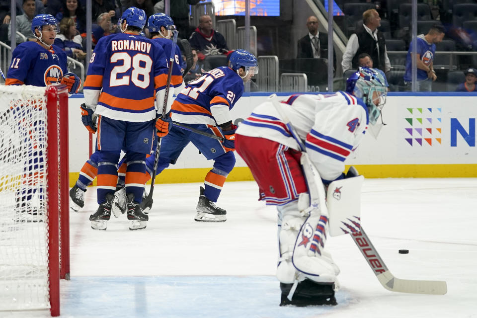 New York Islanders center Kyle Palmieri (21) skates back to his bench after scoring on New York Rangers goaltender Jaroslav Halak (41) in the second period of an NHL hockey game, Wednesday, Oct. 26, 2022, in Elmont, N.Y. (AP Photo/John Minchillo)