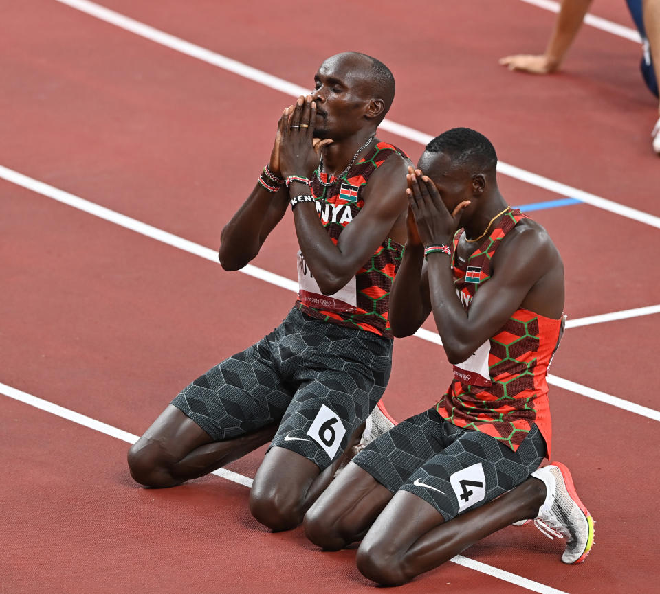 <p>Gold medalist Emmanuel Kipkurui Korir (L) of Kenya and Silver medalist Ferguson Cheruiyot Rotich (R) of Kenya celebrate after the Men's 800m Final during Tokyo 2020 Olympic Games at Olympic Stadium in Tokyo, Japan on August 04, 2021. (Photo by Mustafa Yalcin/Anadolu Agency via Getty Images)</p> 