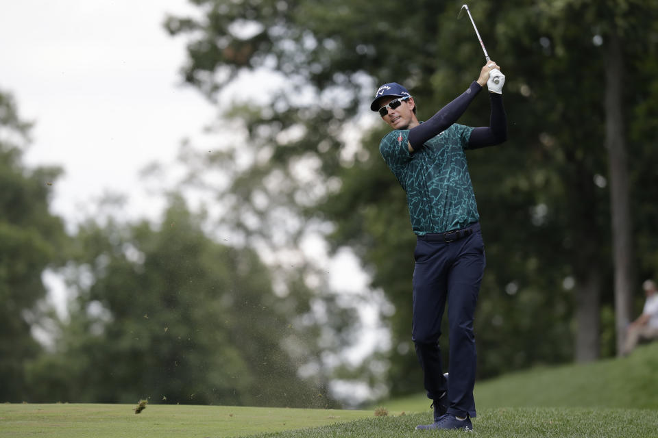 Dylan Frittelli, of South Africa, hits to the ninth fairway during the third round of the Memorial golf tournament, Saturday, July 18, 2020, in Dublin, Ohio. Frittelli, who had tested positive for the coronavirus, played Saturday without a playing partner. (AP Photo/Darron Cummings)