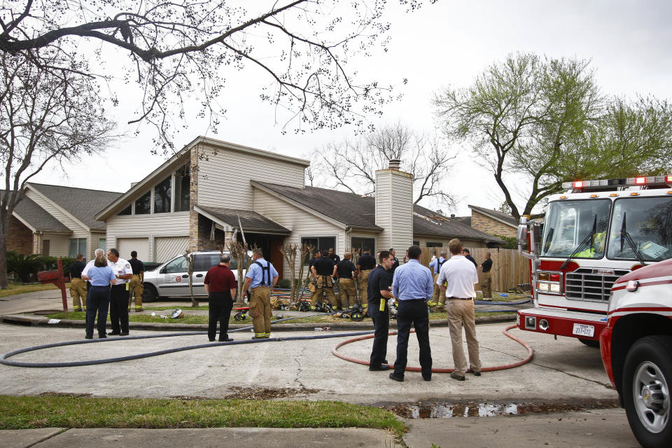 FILE - In this Feb. 24, 2011 file photo, emergency personnel respond to a fire at a home day care operated by Jessica Tata, killing four children in Houston. Some parents took great care in vetting a list of state-licensed day care providers before leaving their children in the hands of Tata. As Tata’s murder trial plays out in a Houston courtroom, child care experts say that while the state has taken steps to improve regulation of home day care centers, Texas is among many states lagging behind what advocates believe should be the standard for keeping tabs on the centers. (AP Photo/Houston Chronicle, Michael Paulsen, File) MANDATORY CREDIT; MAGS OUT; TV OUT