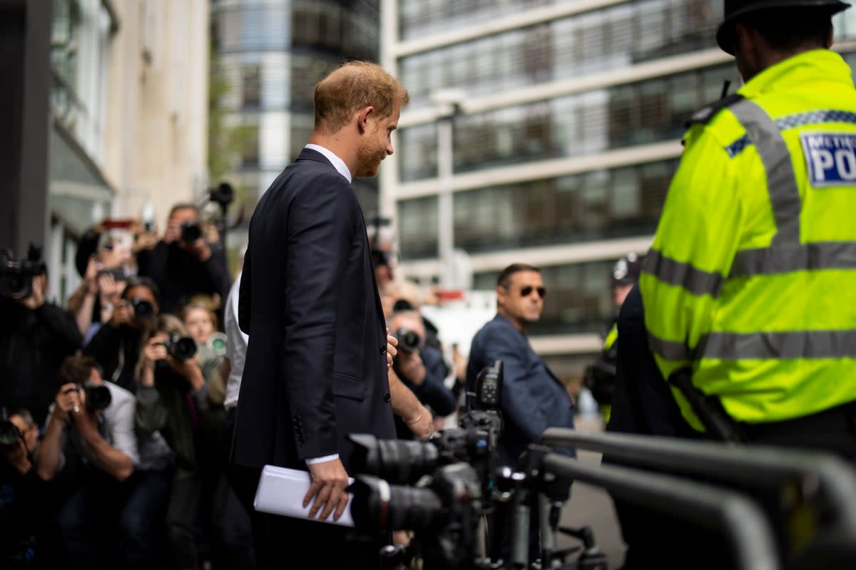 Prince Harry leaves the High Court in London after giving evidence (EPA)