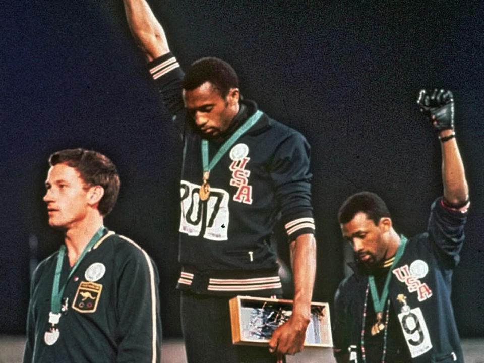 At the Mexico City Summer Olympics in 1968, American sprinters Tommie Smith and John Carlos (who won the gold and bronze medals, respectively, in the 200 meters) wore beads in honor of lynching victims, and as the national anthem played, hung their heads and raised their fists in a salute Carlos says was not anti-American, but pro-Black. / Credit: AP File Photo