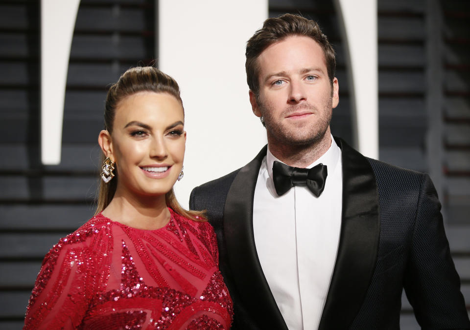 Elizabeth Chambers, here with Armie Hammer at the Vanity Fair Oscar party in 2017, issues new statement amid actor's controversy.