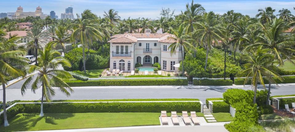 Built in 1992 on the North End of Palm Beach, a six-bedroom house at 240 N. Ocean Blvd looks across the coastal road to its beachfront parcel. The property just entered the market at $39 million.