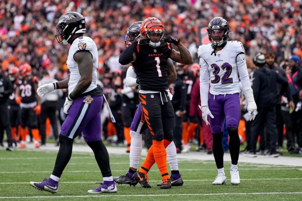 Cincinnati Bengals wide receiver Ja'Marr Chase (1) celebrates a first down reception in the first quarter of the NFL Week 18 game between the Cincinnati Bengals and the Baltimore Ravens at Paycor Stadium in downtown Cincinnati on Sunday, Jan. 8, 2023. The Bengals led 24-7 at halftime.