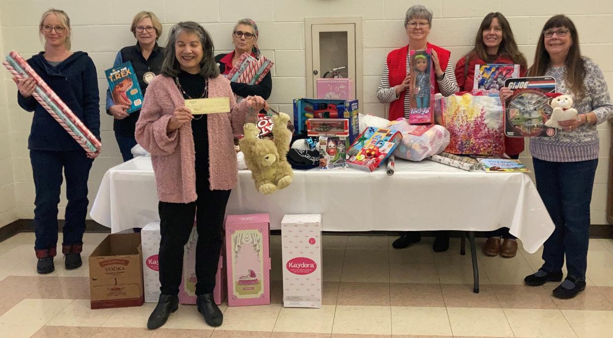 Kent Lions Club members recently donated to Kent Social Services. From left are Becky Lindsay; Diane Nahas; Christy Anderson , accepting the donations for Kent Social Services; Missy Harmon; Nancy Waschsmuth; Paula Lovinsky; and Elaine Sinopoli.