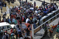 GHAZIABAD, INDIA - MARCH 28: An aerial view of Lal Kuan bus stand where a wave of migrant workers was seen following Uttar Pradesh governments call to arrange buses for the workers returning to their native state, on Day 4 of the 21 day nationwide lockdown -- to check the spread of coronavirus, on March 28, 2020 in Ghaziabad, India. (Photo by Sakib Ali/Hindustan Times via Getty Images)