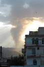 Smoke and flames rise allegedly from Shiite Huthi rebels camps located on Aser mountain following an airstrike by the Saudi-led alliance on April 6, 2015 in the Yemeni capital Sanaa